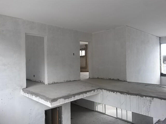 Ceilings and door openings ready for sleek fittings and refined detailing.